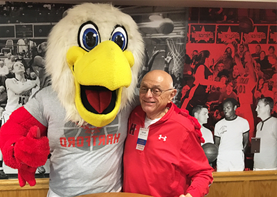 Rosen Society member with Howie the Hawk